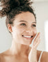woman applying Emani Bright Eyes Super Eye Cream 
